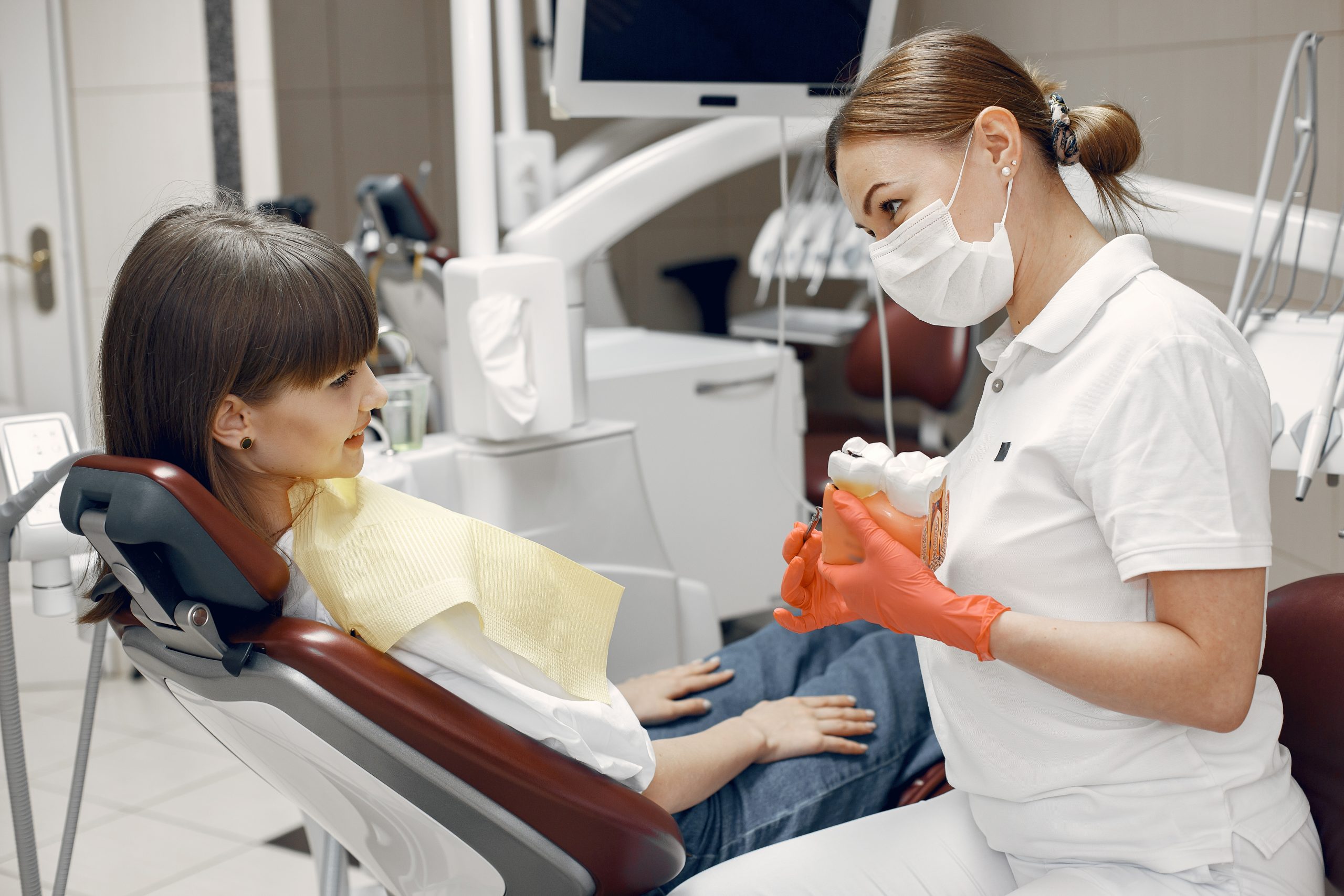 Young woman at the dentist’s reception
